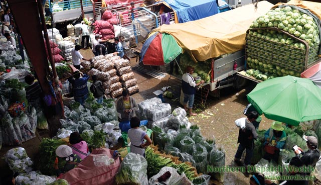 Vegetable trading post built La Trinidad economy