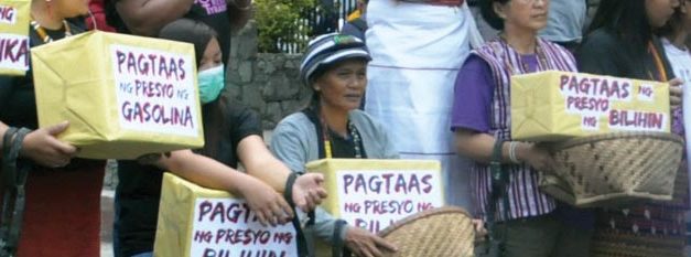 Women march against Train Law